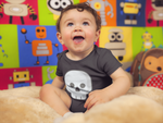 Load image into Gallery viewer, Organic Short Sleeve Black Skull Baby Bodysuit
