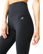 Load image into Gallery viewer, Energique Athletic Leggings With Reflective Strips and Mesh Panels
